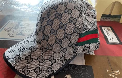 como saber si una gorra gucci es original|etiqueta de autentica Gucci.